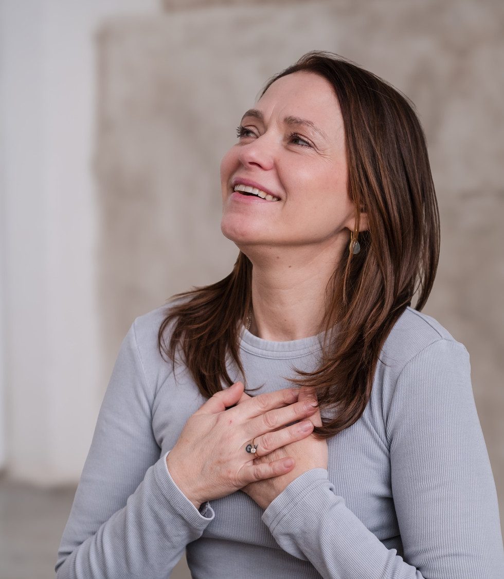 Petra smiling, hands on her heart